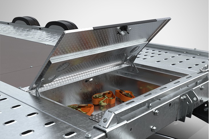 Förvaringsfack i golv framtill